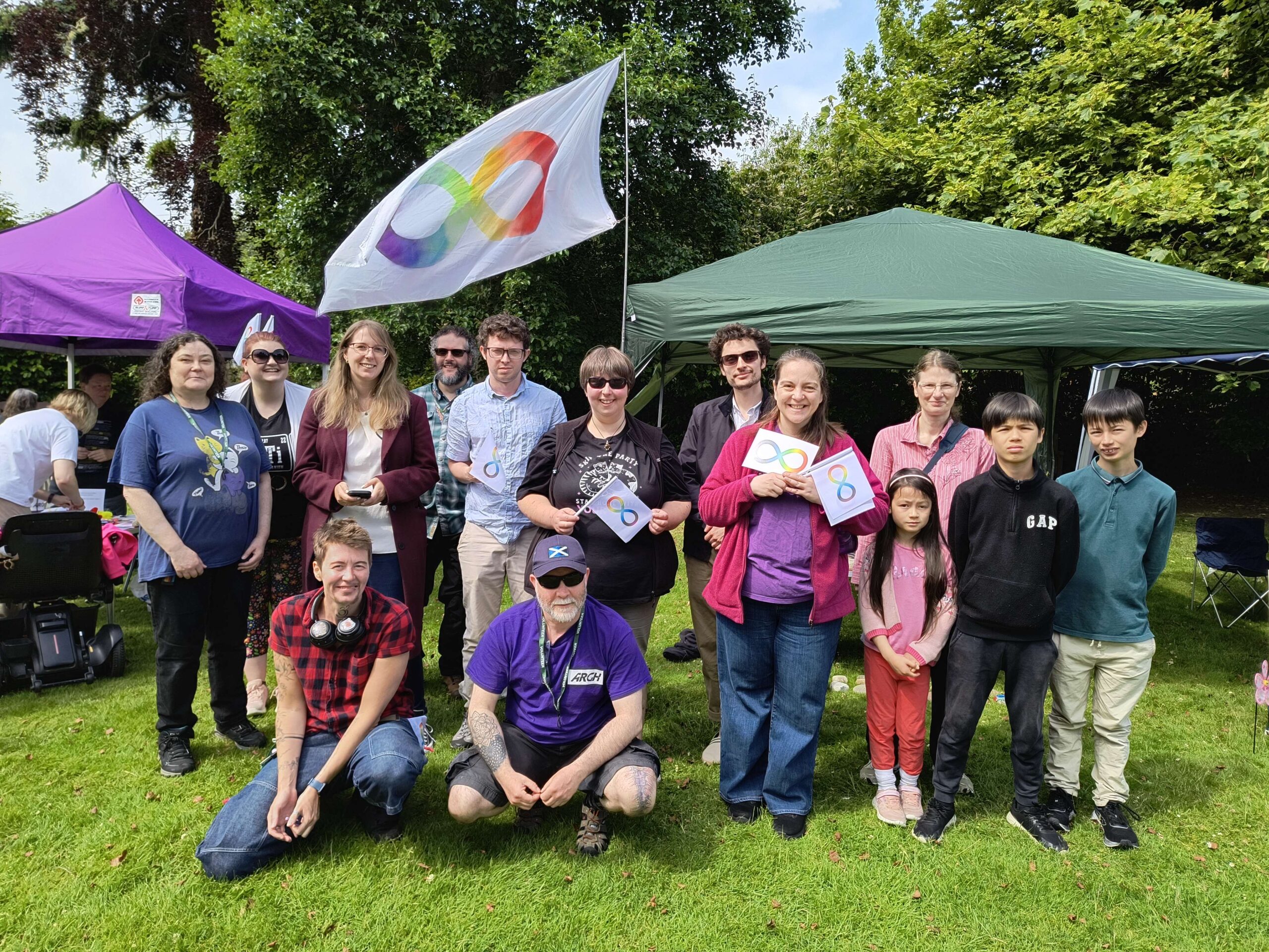 An image from Autistic Pride 2025 with lots of attendees